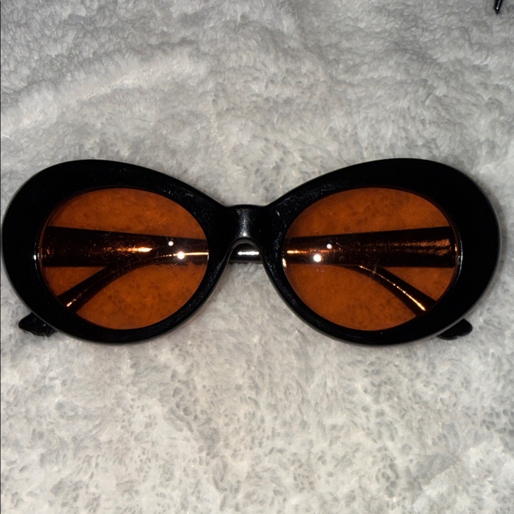 Elegant Black, White, and Orange Sunglasses Trio - Picture 4 of 6